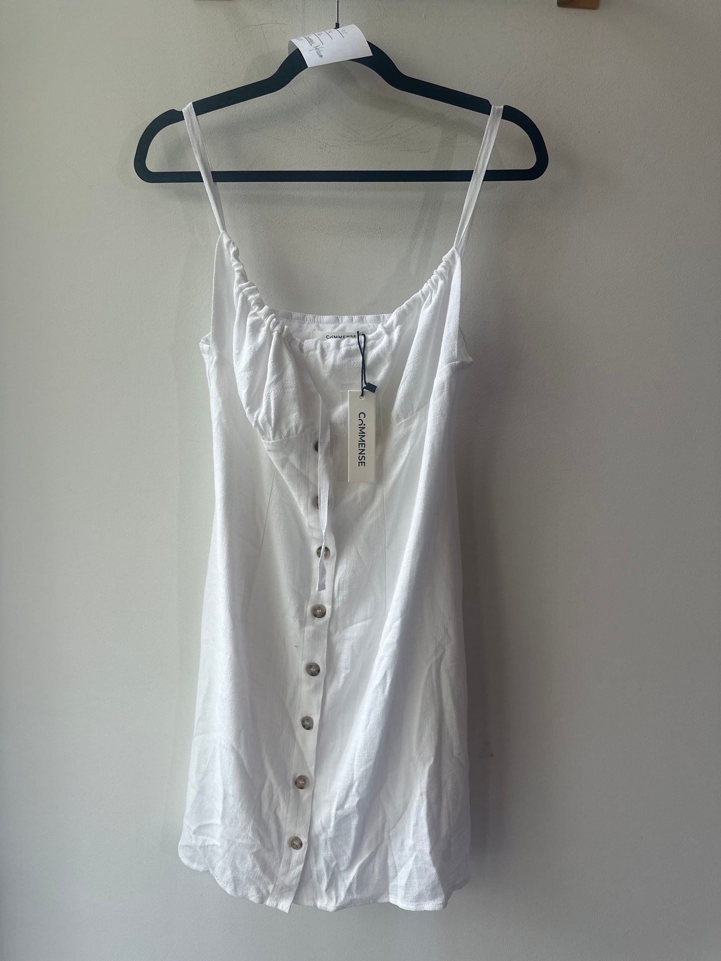 White Dress. Side gold metal detail