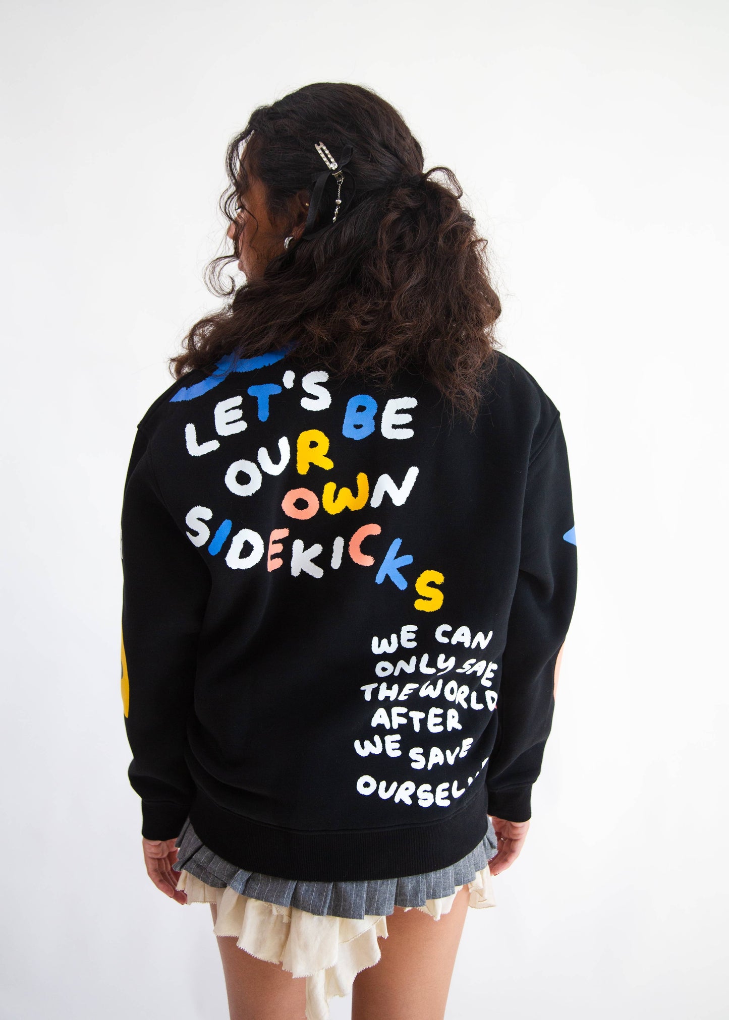 SIDEKICK: Black fleece-lined crewneck sweater