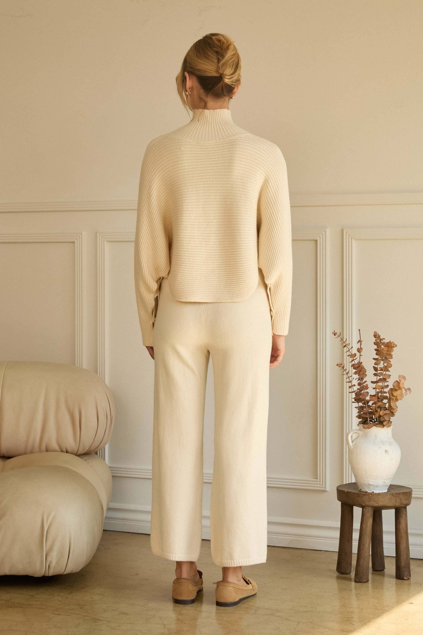 ASYMMETRICAL BUTTON-SLEEVE RIBBED MOCK NECK SWEATER TOP